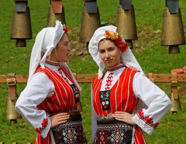 Vratsa, Bulgaria - June 24, 2018: People in traditional authentic folk costumes, recreating the traditional Bulgarian northern wedding on National folklore fair 