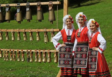 Vratsa, Bulgaria - June 24, 2018: People in traditional authentic folk costumes, recreating the traditional Bulgarian northern wedding on National folklore fair 