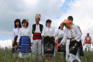 Vratsa, Bulgaria - June 24, 2018: People in traditional authentic folk costumes, recreating the traditional Bulgarian northern wedding on National folklore fair 