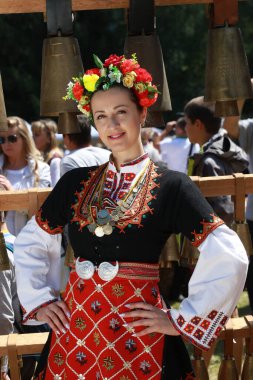 Vratsa, Bulgaria - June 24, 2018: People in traditional authentic folk costumes, recreating the traditional Bulgarian northern wedding on National folklore fair 