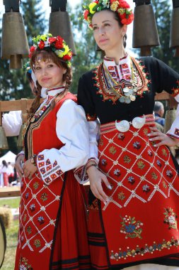 Vratsa, Bulgaria - June 24, 2018: People in traditional authentic folk costumes, recreating the traditional Bulgarian northern wedding on National folklore fair 