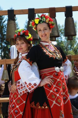 Vratsa, Bulgaria - June 24, 2018: People in traditional authentic folk costumes, recreating the traditional Bulgarian northern wedding on National folklore fair 