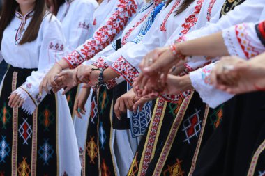 Vratsa, Bulgaria - June 24, 2018: People in traditional authentic folk costumes, recreating the traditional Bulgarian northern wedding on National folklore fair 