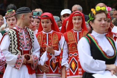 Vratsa, Bulgaria - June 24, 2018: People in traditional authentic folk costumes, recreating the traditional Bulgarian northern wedding on National folklore fair 
