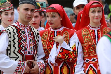 Vratsa, Bulgaria - June 24, 2018: People in traditional authentic folk costumes, recreating the traditional Bulgarian northern wedding on National folklore fair 