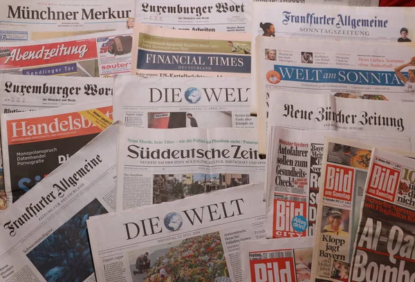 World Newspapers. Collage of paper headlines about the World Newspapers