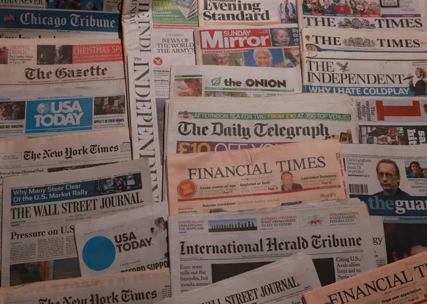 World Newspapers. Collage of paper headlines about the World Newspapers