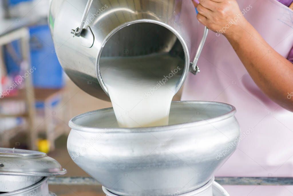 Pour milk into the Milk bucket.