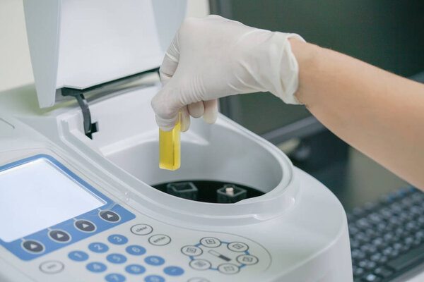 Scientist working at water quality test  use by Spectrophotometer in the laboratory