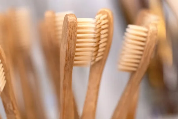 Bamboo toothbrush in zero waste shop. Eco friendly biodegradable toothbrush.
