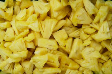 Ananas dilimleri arka planda. tam çerçeve çekimi