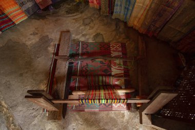 sasak tribe traditional weaving tool clipart
