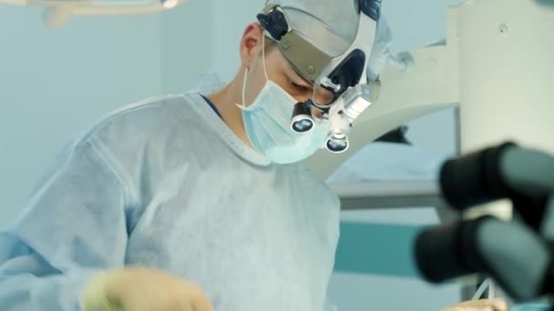 Surgeons Perform Operation Look Microscope — Stock Video
