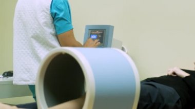 Magnetic field illumination. Magnetic field, leg rehabilitation in osteoarthritis