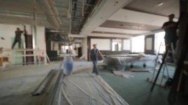 İnşaat, inşaat işçileri. Bulanık Arkaplan