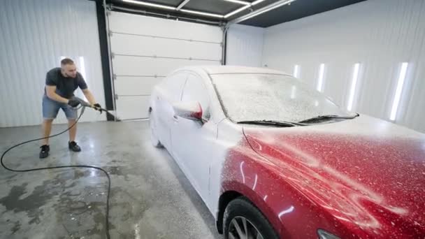 Car Washing Cleaning Foam High Pressured Water Red Car — Stock Video