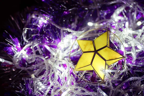 Christmas Decorations: Yellow Star Ornament for Christmas Tree with White Lights and Purple Boas