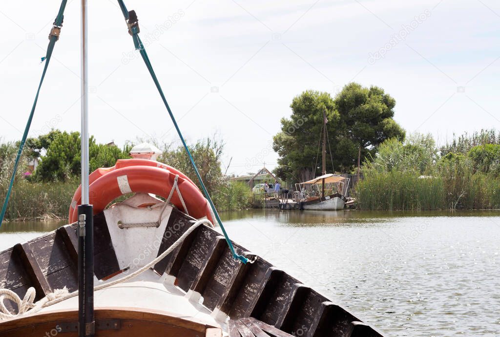 Boats on the lake of La Albufera in Valencia. Holidays, boating.