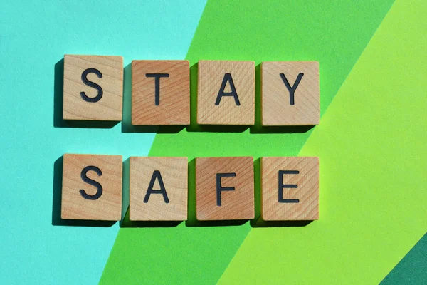 Stay Safe Words Wooden Alphabet Letters Isolated Green Background — Stock Photo, Image