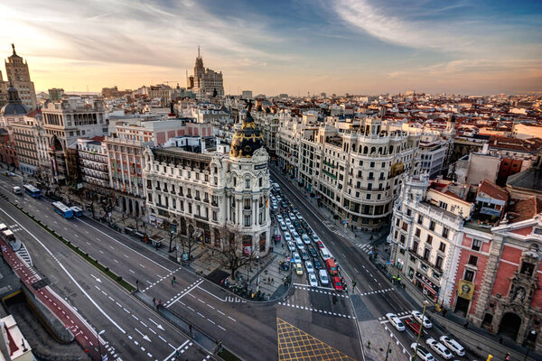 View of the Metropolis Building with a nice sunset in the center of Madrid