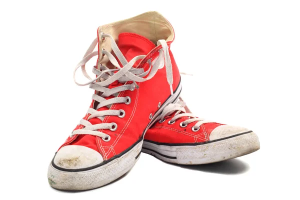 Old Dirty Red Canvas Sneakers Isolated White Stock Picture