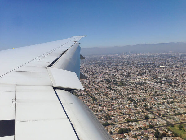 Wing captured from plane in Los Angeles