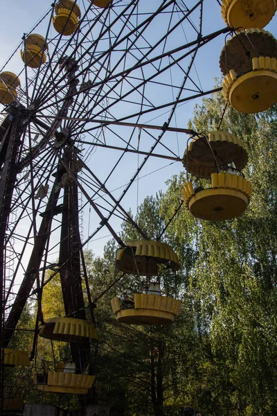 Pripyat abadoned wheel on square inside ghost town
