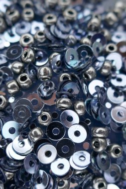 Sequins. Işıldayan pullar arka plan