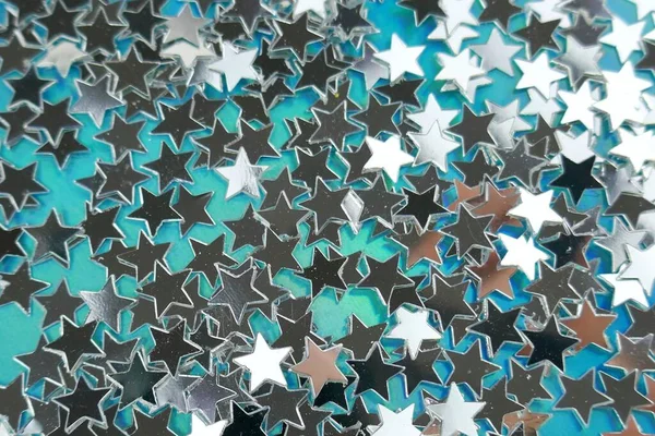 Festive star glitter background. Shining phone wallpaper