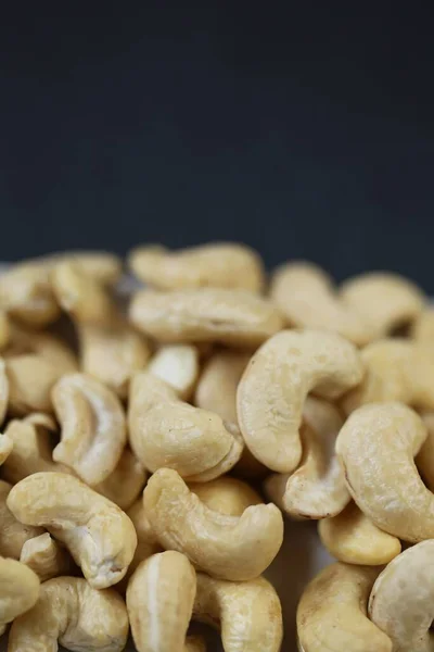 Cashew nuts on a black background.Cashew nut background