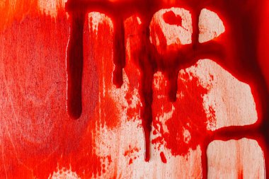 Kanlı doku. Kırmızı kan akışı. Tahta dokuya kan damlıyor..