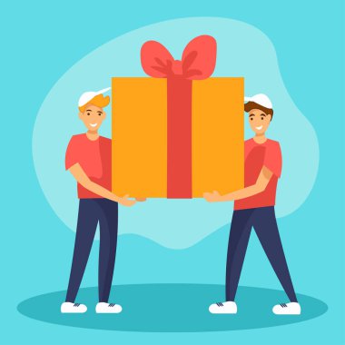 İki adam büyük bir hediye kutusu taşıyor. Arkadaşlar doğum günü partisine gider. Ya da teslimat servisi hediye getirir..