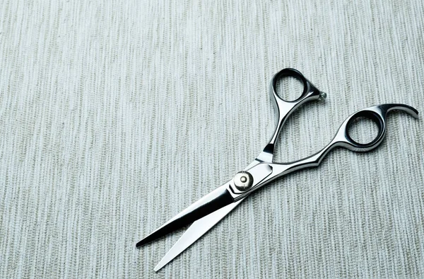 Stylish Professional Barber Scissors; Hairdresser salon concept;Haircut accessories.