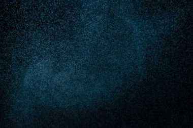 Siyah arkaplanda soyut su sıçramaları