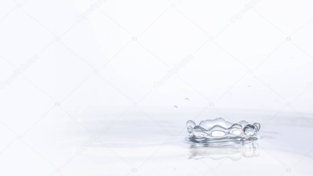 Water drop on water background