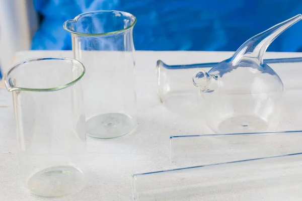 Empty laboratory glassware, instruments and objects in the sterile table