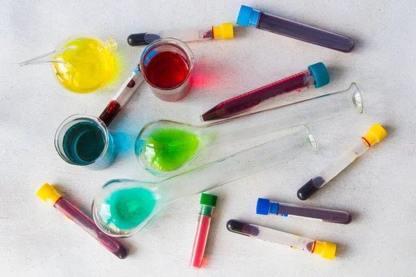 Laboratory Glassware Colored Reagents White Background Blood Tube Samples — Stock Photo, Image