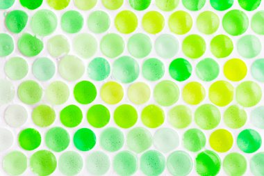 Renkli ve çok renkli bal peteği formu arka plan, sarı ve yeşil renkler daireler şeklinde.