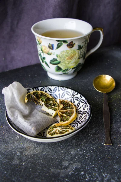 Set of tea, vintage silverware spoons, various of tea and cup of tea