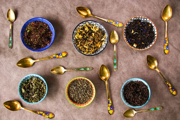 Herbal and natural dry tea set, variation and collection of tea and vintage spoons