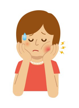 Diş ağrısı olan bir kadın.