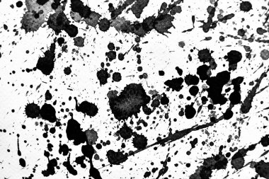 Arka plan siyaha boyanır. Mürekkep ve suluboya sanatından yaratıcı soyut sanat.