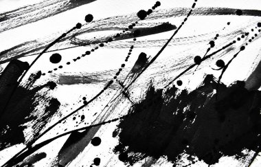 Beyaz kağıda siyah mürekkep damlacıkları