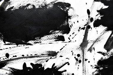 Beyaz kağıda siyah mürekkep damlacıkları