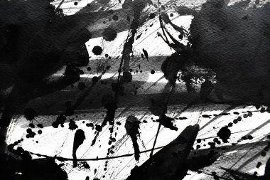 Arka plan siyaha boyanır. Mürekkep ve suluboya sanatından yaratıcı soyut sanat.