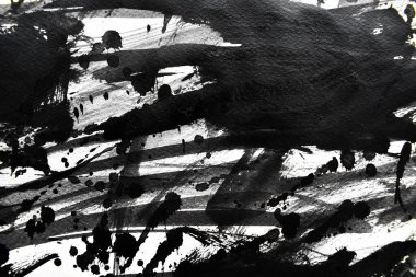 Arka plan siyaha boyanır. Mürekkep ve suluboya sanatından yaratıcı soyut sanat.