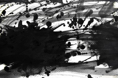 Arka plan siyaha boyanır. Mürekkep ve suluboya sanatından yaratıcı soyut sanat.