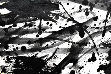 Arka plan siyaha boyanır. Mürekkep ve suluboya sanatından yaratıcı soyut sanat.