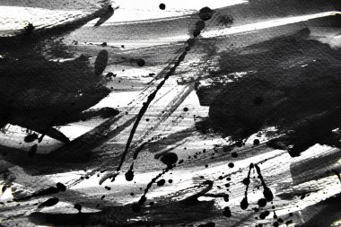 Arka plan siyaha boyanır. Mürekkep ve suluboya sanatından yaratıcı soyut sanat.