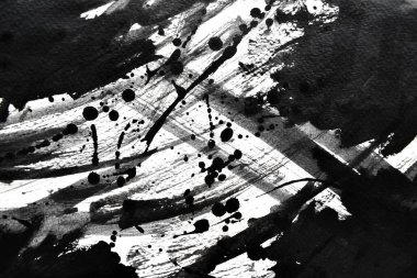 Arka plan siyaha boyanır. Mürekkep ve suluboya sanatından yaratıcı soyut sanat.